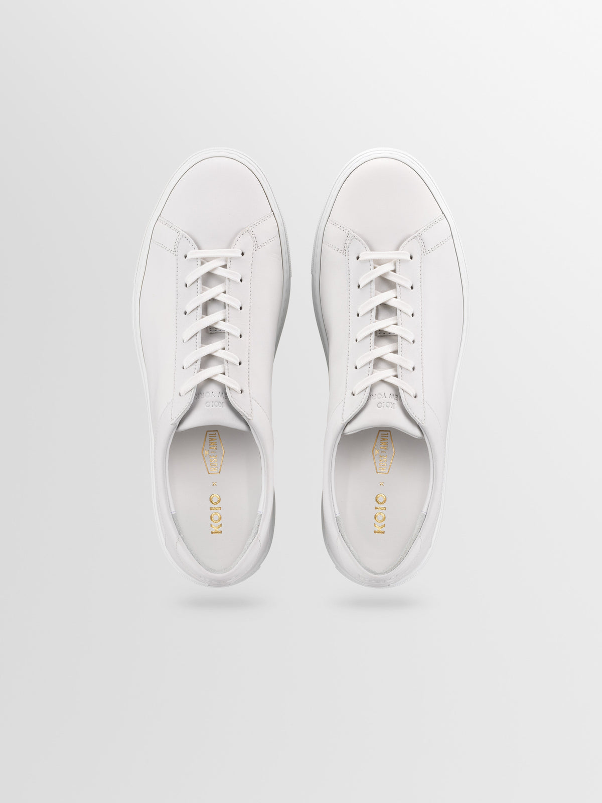 Capri Leather Sneaker in Triple White Rose Anvil