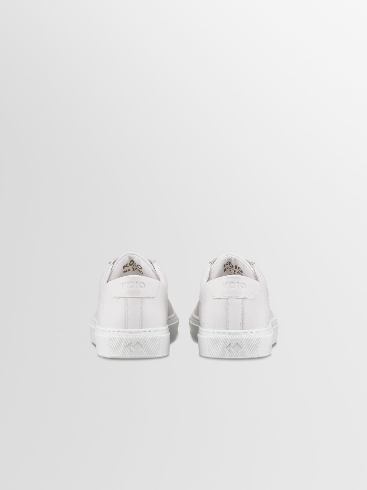 Capri Leather Sneaker in Triple White Rose Anvil