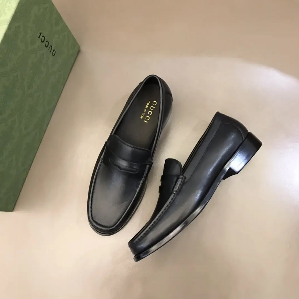 Gucci Black Leather Penny Loafers