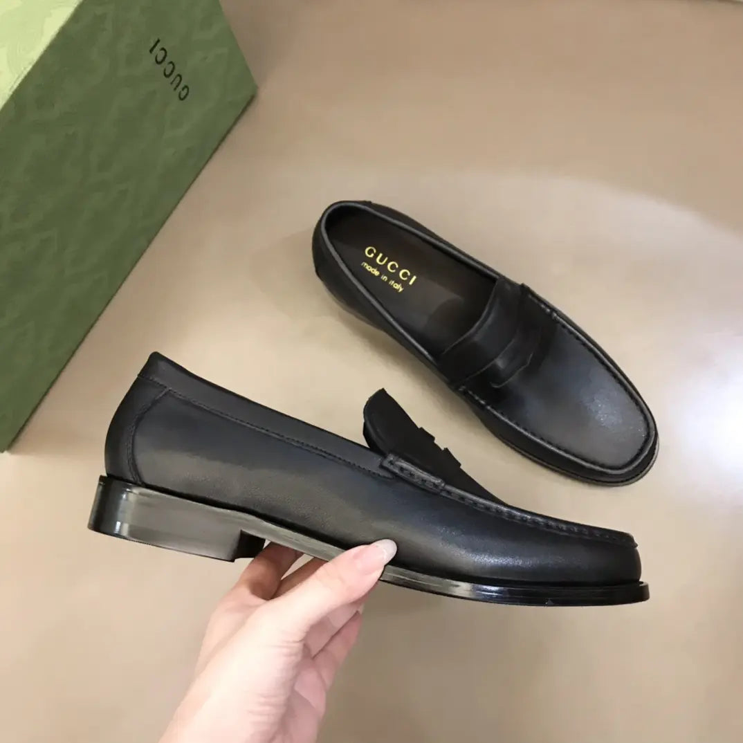 Gucci Black Leather Penny Loafers